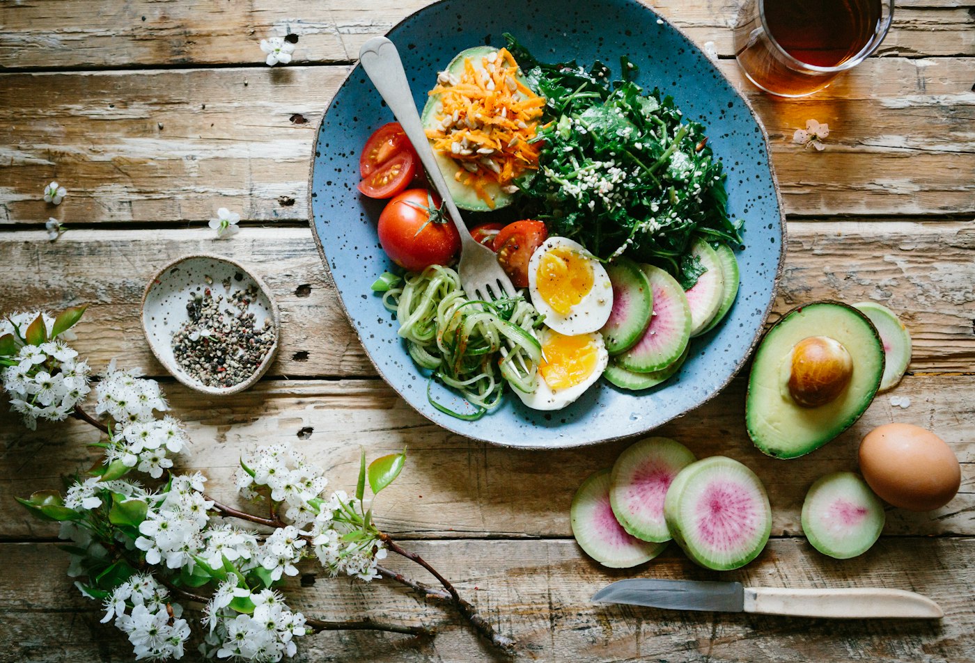 Breakfast plate with eggs, greens and vegetables